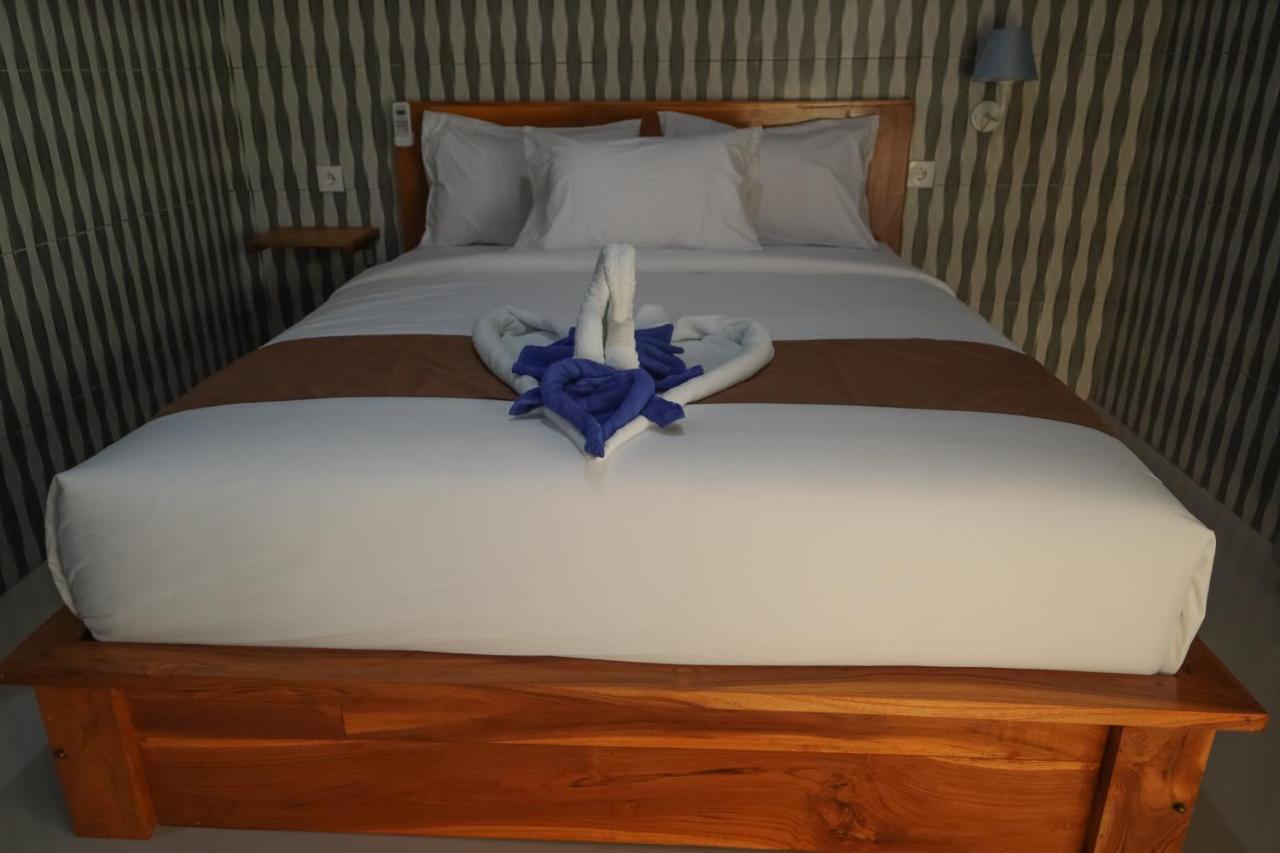 Prasi Sunrise Homestay Toyapakeh Екстер'єр фото
