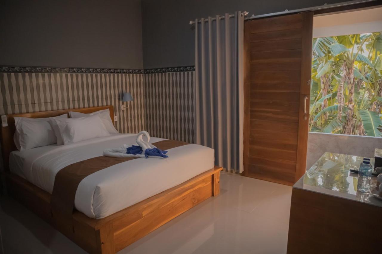 Prasi Sunrise Homestay Toyapakeh Екстер'єр фото